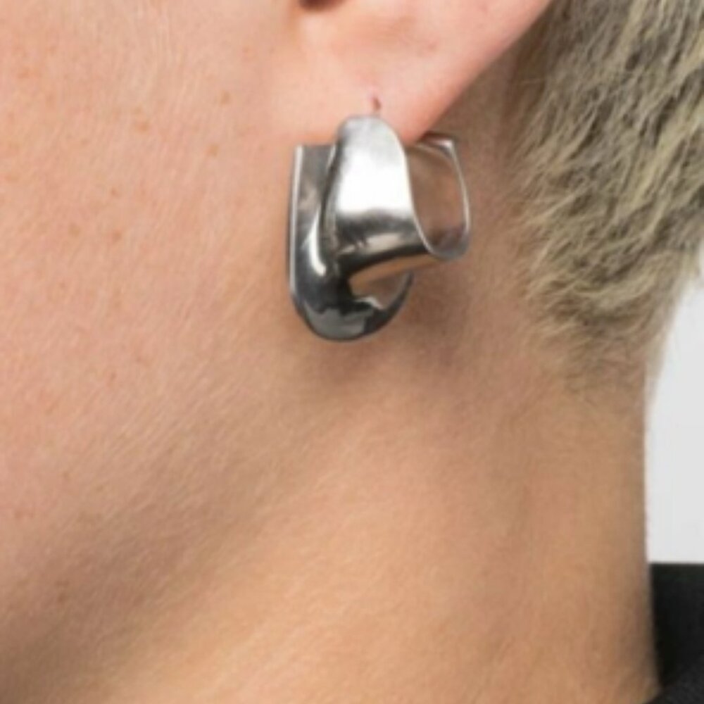 Ferragamo Silver-Tone Orecc Hoop Earrings crafted from brass. Silver-tone brass